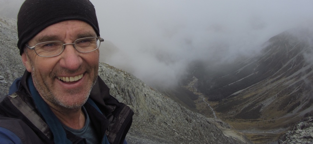 GJ Coop, one happy tramper, climbing up the almost steep slope to David Saddle, Nelson Lakes National Park