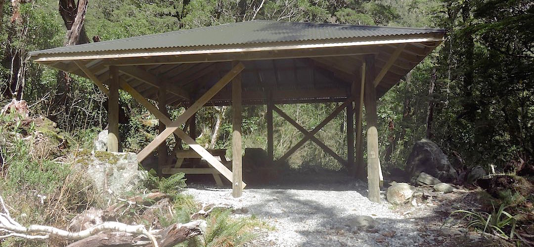 Just a big roof really, held up on some sticks of timer. | Andersons Cascade Shelter, Milford Track
