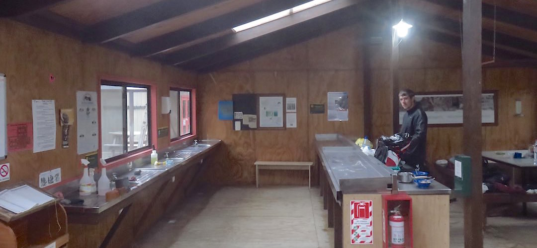The kitchen area although with the covers still on the gas stoves.  | Clinton Hut, Milford Track