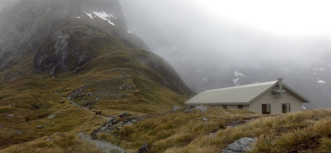 Yeah, the shelter is nestled into the base of Mount Balloon, 1847m. | Mackinnon Pass Shelter
