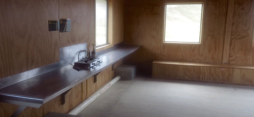 Gas burner and benches. | Mackinnon Pass Shelter