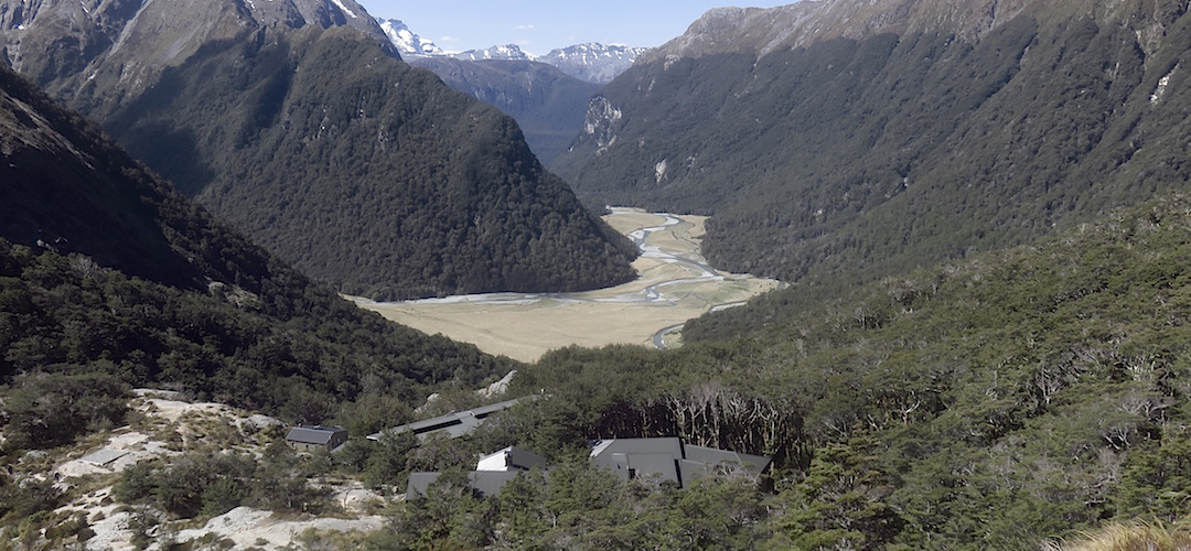 There's a great view up behind the two huts, guided closest, DOC behind. | Routeburn Falls Hut, Routeburn Track