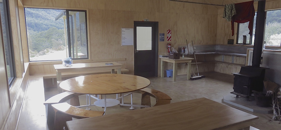 Big picture windows in the living area.  | Caples Hut, Caples Track