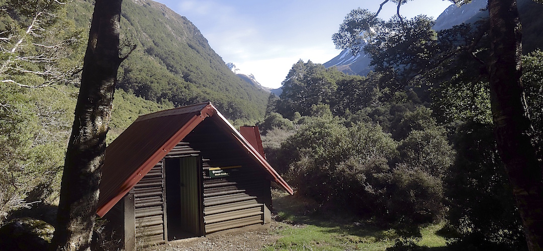 Cute picture with a view right up to the saddle.  | Steele Creek Hut, Greenstone Track