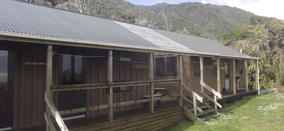 Love the verandahs and not for the sun shading.  | Martins Bay Hut, Hollyford Track