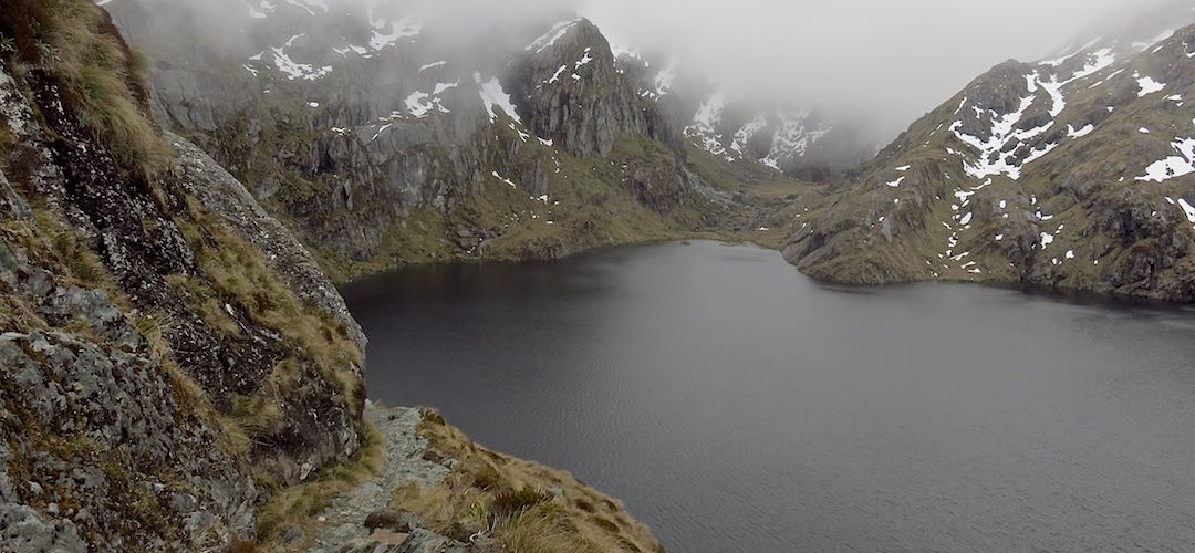 The track is not as perilous as this makes out above Lake Harris. | Milford Track, Fiordland National Park
