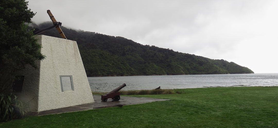 This curious, lumpy monument is to Captain James Cook who anchored here 5 times. | Ships Cove, Queen Charlotte Track