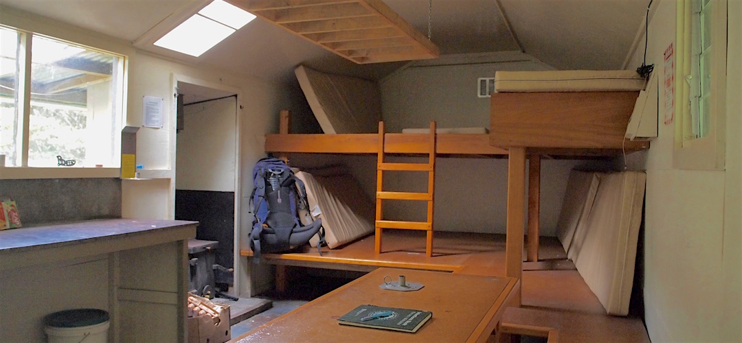 There's the sleeping area, but it might be tight fit with 10 bodies. |  Helicopter Flat Hut, Kahurangi National Park