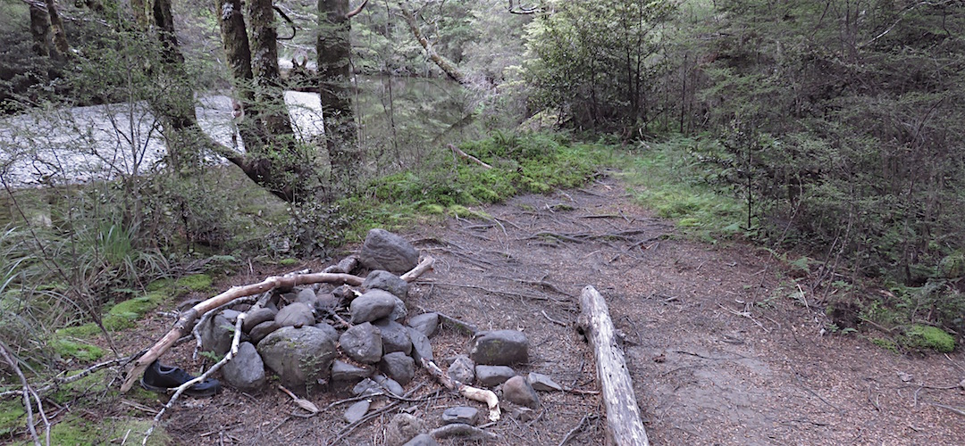 The Anatoki River and fireplace. | Point 744 campsite, Anotoki River, Kahurangi National Park
