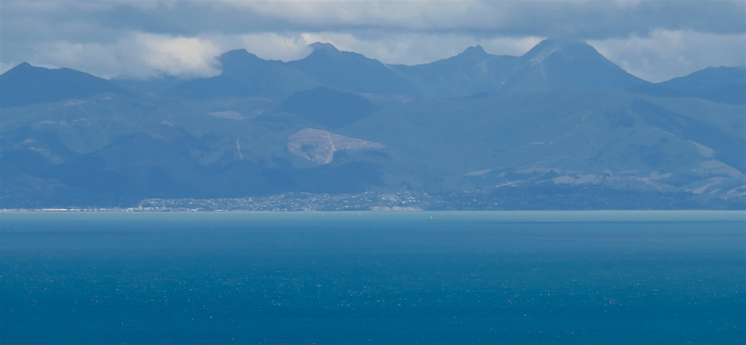 The view over to Nelson with the top of Mount Richmond in cloud. |  Abel Tasman National Park