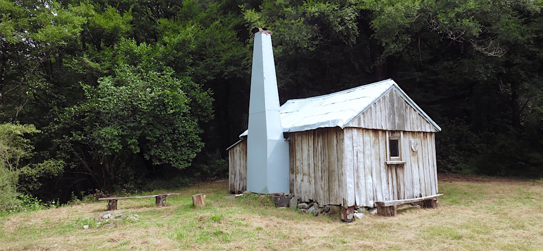 Newly painted roof and chimney. | Cecil Kings Hut, Wangapeka Track, Kahurangi National Park