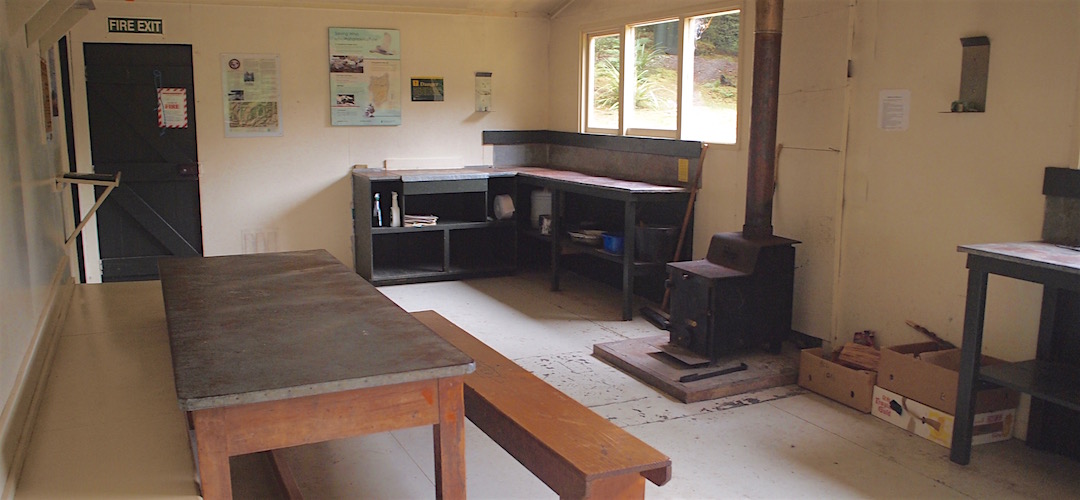 The living area is huge. Plenty of bench space and a large table. | King Creek Hut, Wangapeka Track, Kahurangi National Park