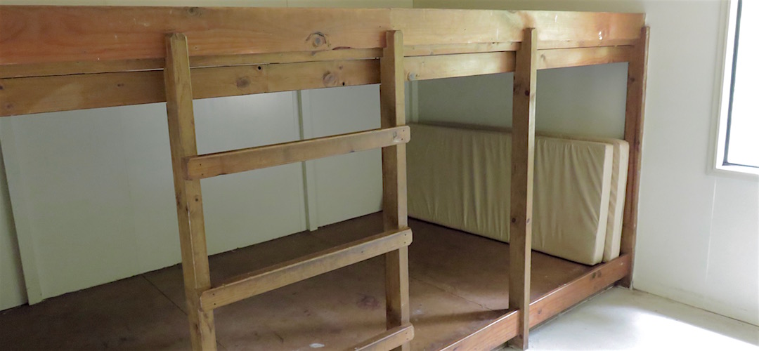 There's a couple of bunkrooms with two sleeping platforms. | King Creek Hut, Wangapeka Track, Kahurangi National Park