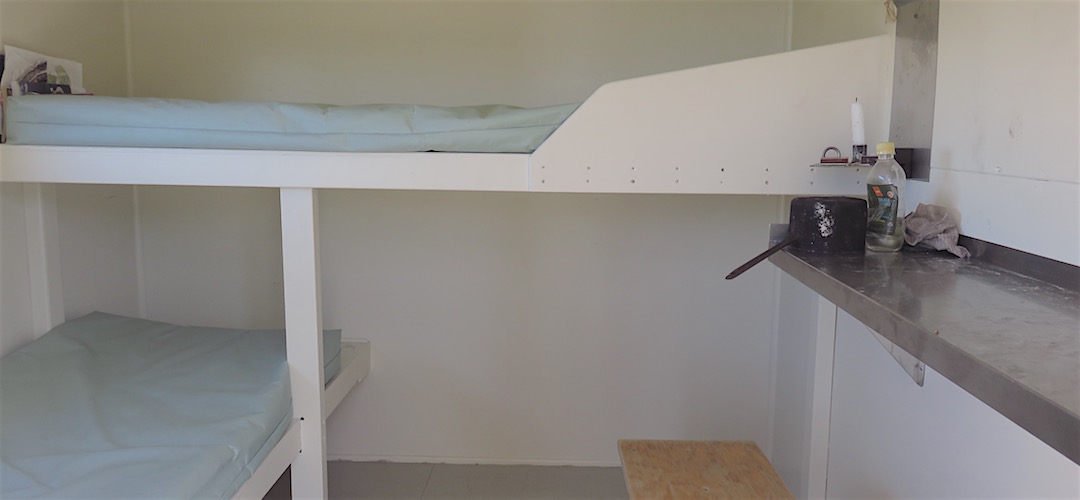 Fairly compact inside.| Poor Petes Hut, 1000 Acre Plateau, Kahurangi National Park