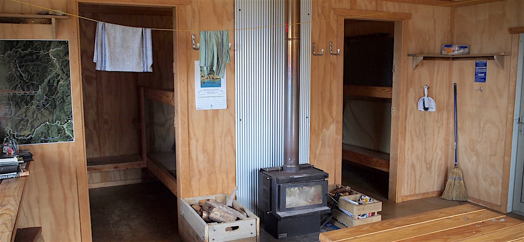 There's 3 sleeping compartments, 4 bunk spaces each, opening directly off the main room. | Ghost Lake Hut, Lyell Range/Radiant Range Conservation Area