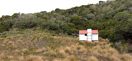 The famous hut, out in the red tussock of the Mackay Downs. | Ministry of Works Historic Hut route, Kahurangi National Park