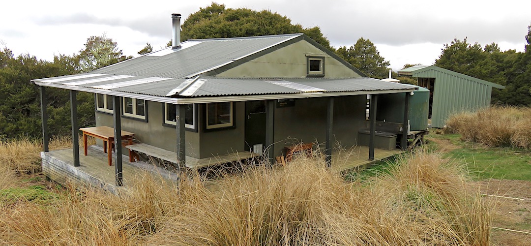 The big verandah was added in the 1995 renovation of the hut built in 1963. | Balloon Hut, Kahurangi National Park