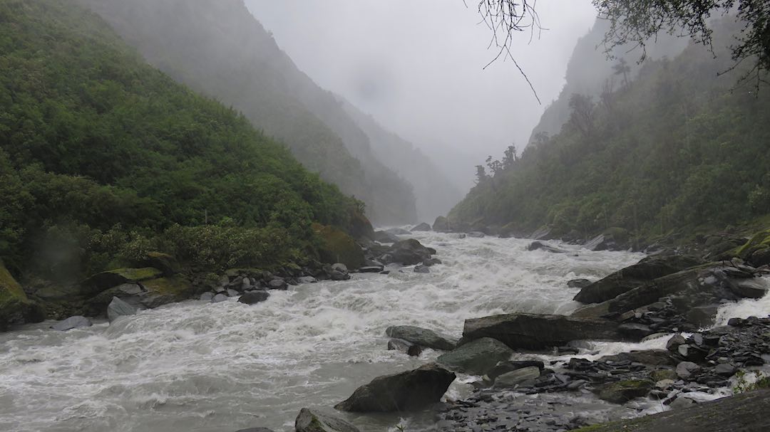 Whitcombe River in flood. Much bigger and more gnarly than it looks. |  Frew/Toaroha Saddles, Westland