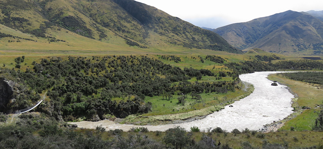 The Waiau River in flood and the handy swingbridge. | Kaikoura to Boyle Village