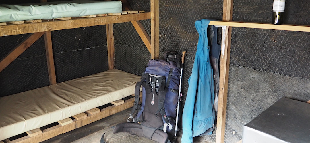 No insulation or internal wall lining in the older hut. | Cedar Flats Historic Hut, Toaroha River, West Coast