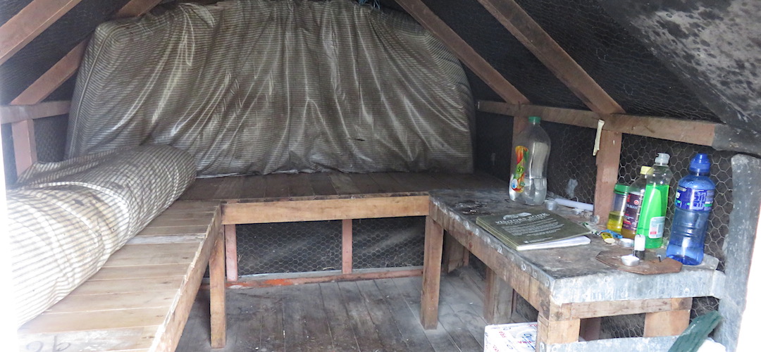 The 100 year old mattress covers the small end window. | Frew Saddle Bivvy, Frew Creek, West Coast