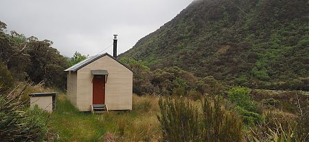 The exterior has been recently tidied up and repainted. | Top Toaroha Hut, Toaroha River, West Coast