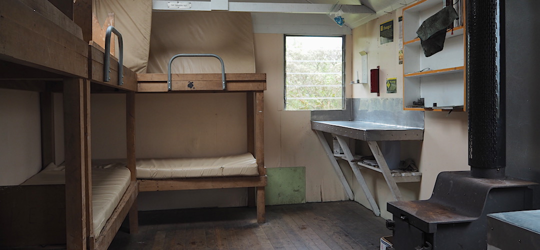 Standard NZFS configuration for 6 bunker. Kitchen bench. | Top Toaroha Hut, Toaroha River, West Coast