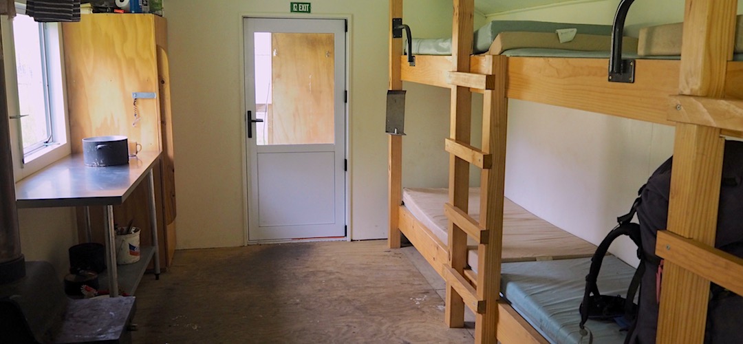 Plenty of bench space and the bunks are spread out and comfortable. | Lake McRae Hut, Lake McRae