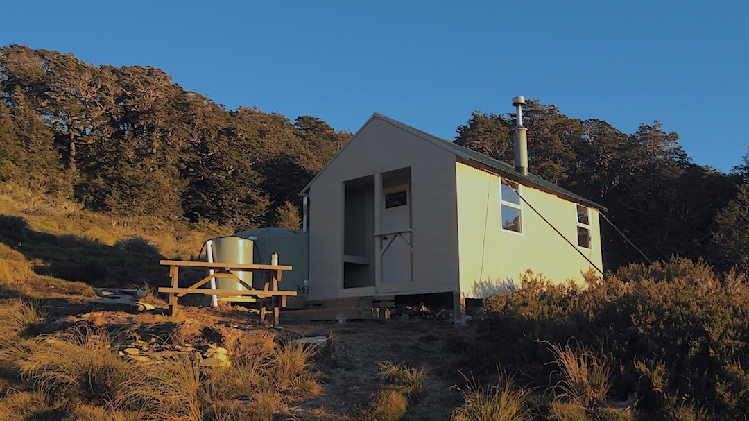 Relocated, painted, new water tank, generally restored. | Mt Fell Hut, Mt Richmond Forest Park