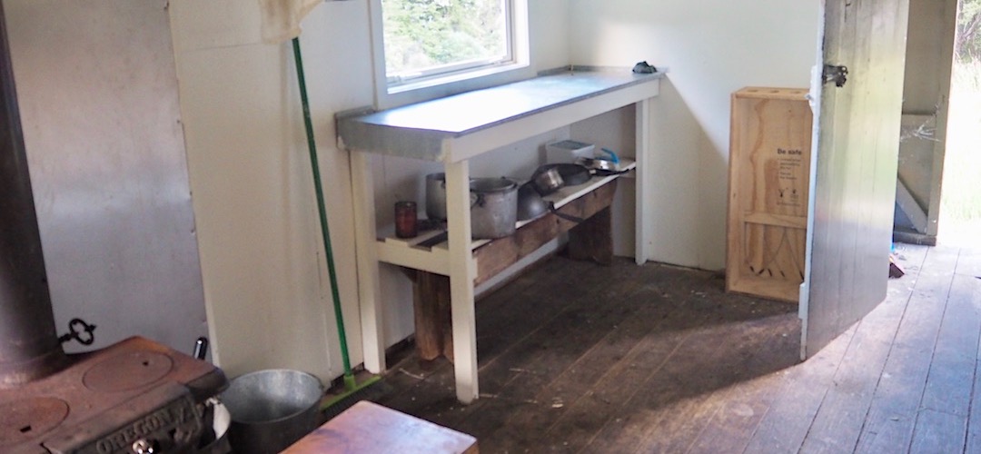 Enough bench space and a few kitchen bits. | Penk Hut, Ferny Gair Conservation Area, Marlborough