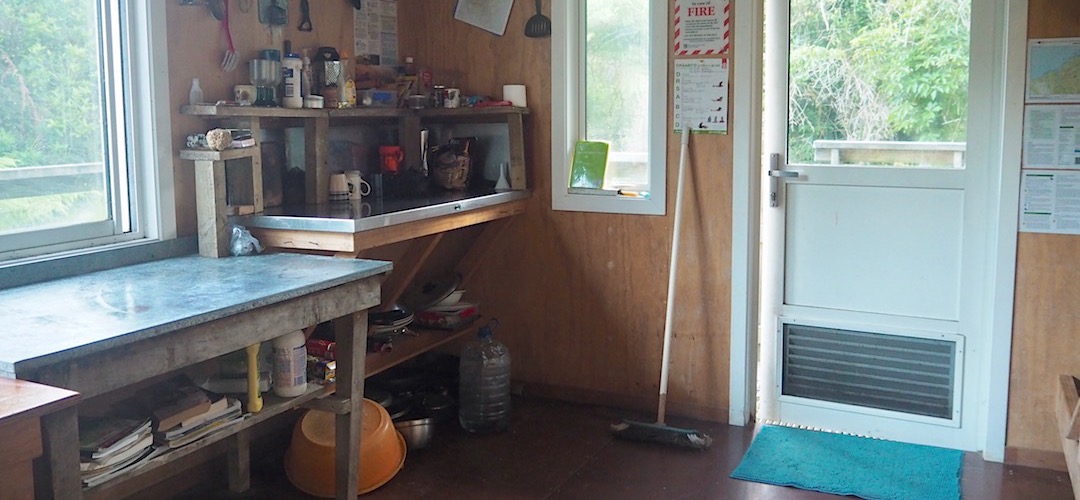 The kitchen area is well stocked for a DOC hut. | Stafford Hut, South Westland