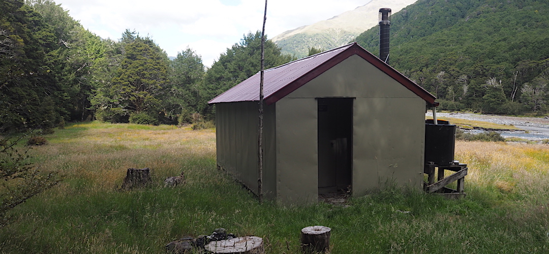 A shady setting in winter due to the trees. Good views. | Top Hope Hut, Lake Sumner Forest Park
