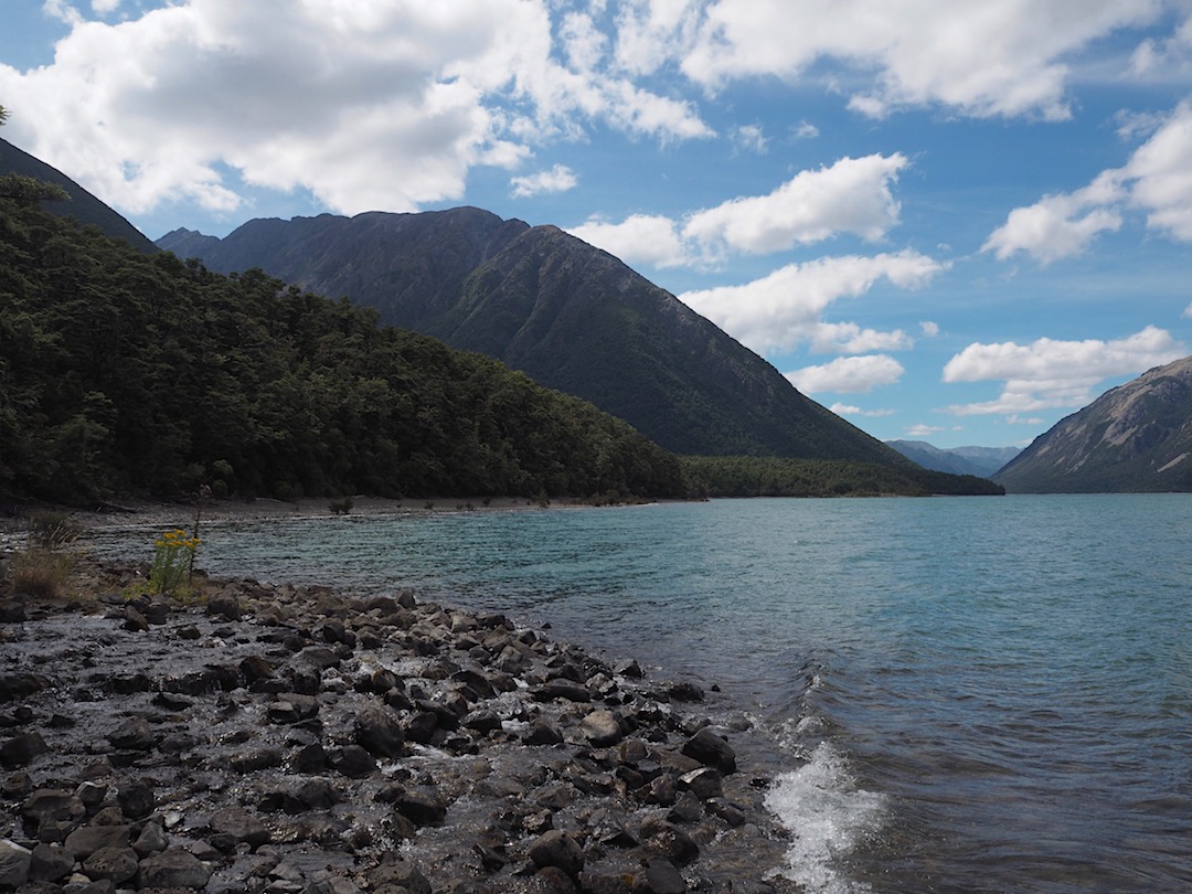 At Lake Sumner, you walk around the lake edge from Marion Bay for a while before getting into heavy-duty sidling past Evangeline Stream.