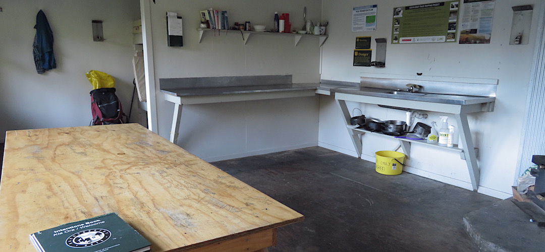 Reasonable bench space, and a working tap for the sink.  | Wairaurahiri Hut, near Fiordland National Park