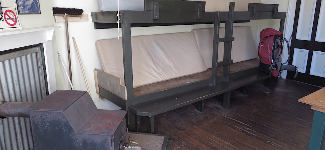 Low level, only double decker, bunks as well.  |  Port Craig Schoolhouse Hut, near Fiordland National Park