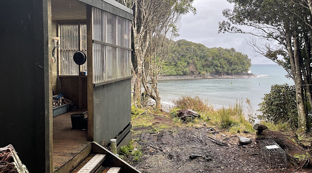 Good view of the sea from the exterior.  | Christmas Village Hunters Hut, Stewart Island/Rakiura 