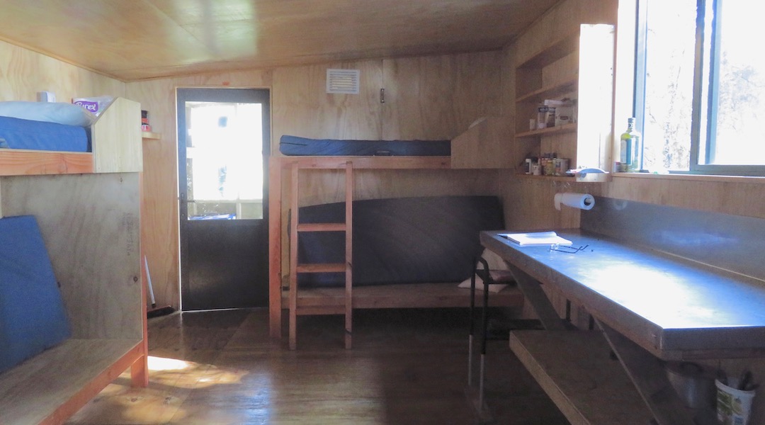 Decent amount of bench, and space in general.  | Smoky Hunters Hut, Stewart Island/Rakiura 