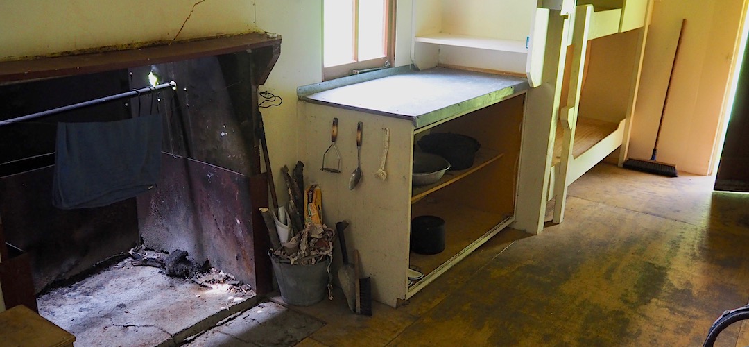 Still with an open fireplace, and a decent woodshed.  | Begley Hut, Begley River