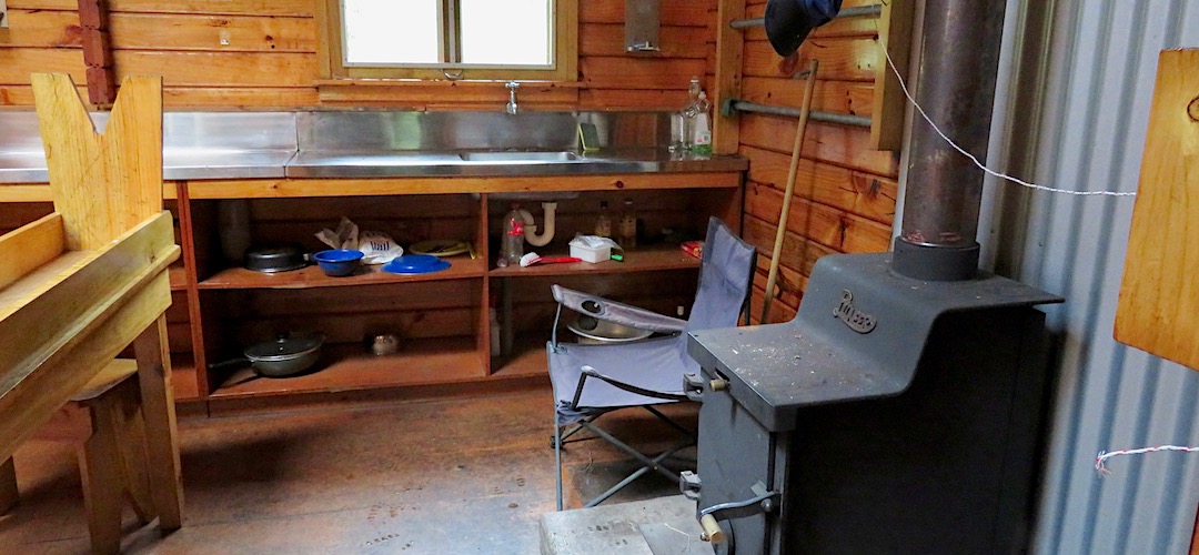 Good bench space, and the tap works. | Maori Saddle Hut, Haast Paringa Cattle Trail