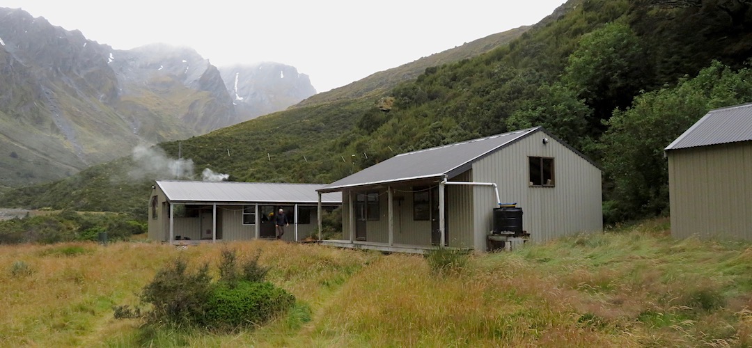 Main building with woodburner, and two bedroom block. | Shelter Rock Hut, Rees Dart Track