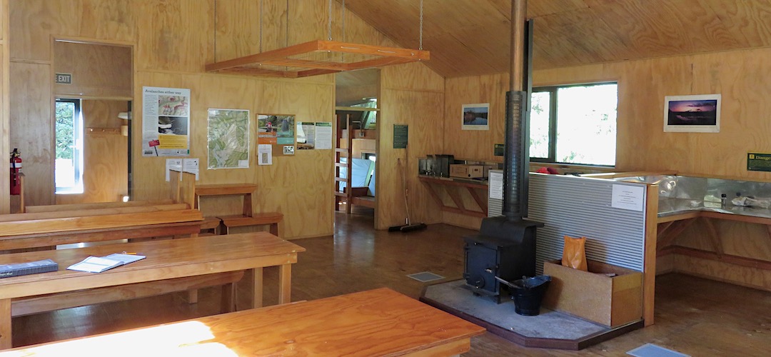 Living area, with sleeping areas behind. | Dart Hut, Rees-Dart Track, Mt Aspiring National Park