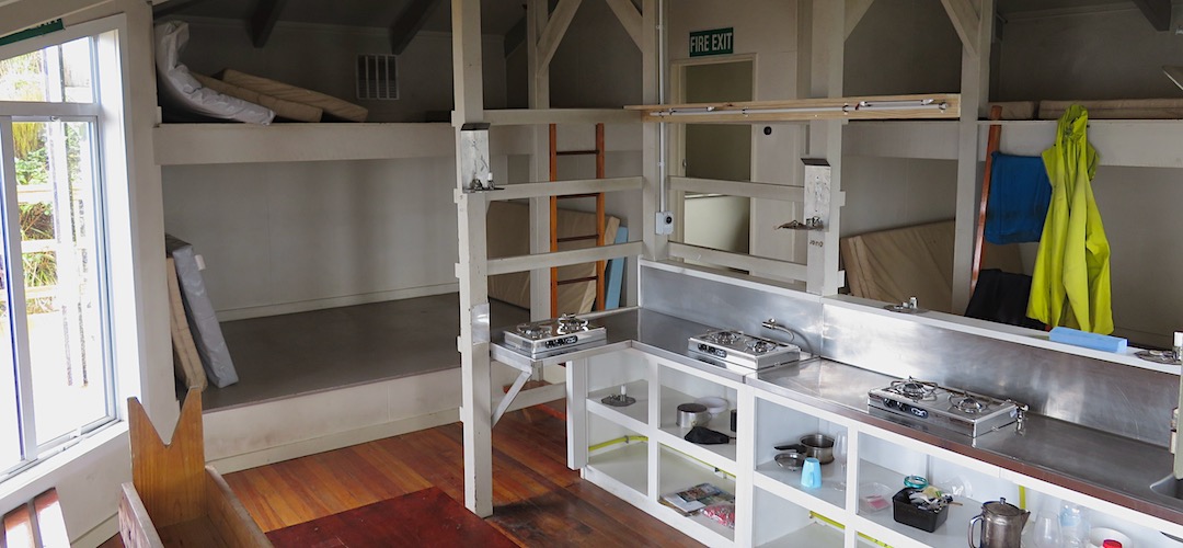 Four sleeping platforms, three sets of gas burners, and an internal sink. | Ces Clarke Hut, Paparoa Great Walk