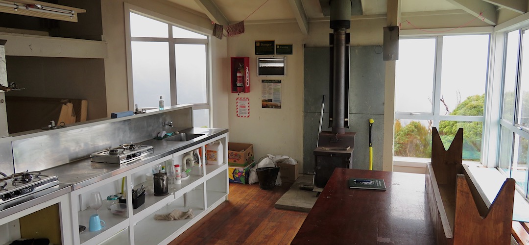 The wood burner is useful in winter. | Ces Clarke Hut, Paparoa Great Walk