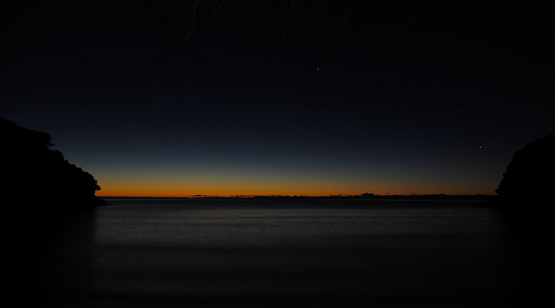 Sunrise at Te Pukatea Bay campsite, Abel Tasman National Park