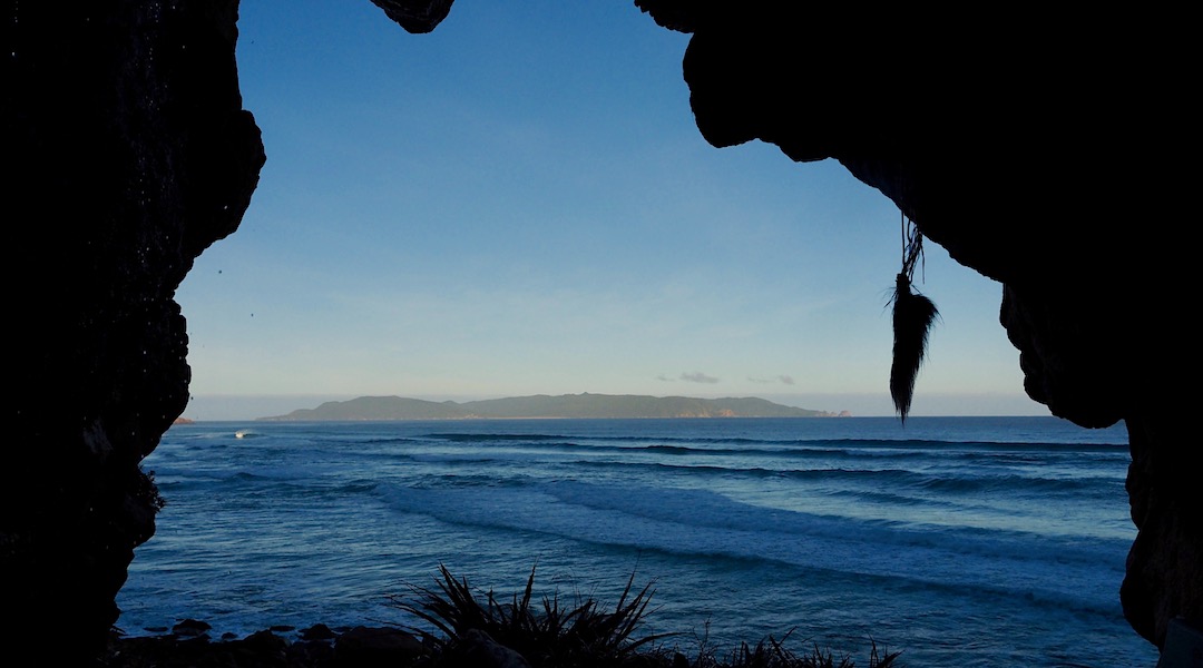 Codfish Island from cave at West Ruggedy Beach. | Northwest Circuit, Rakiura National Park