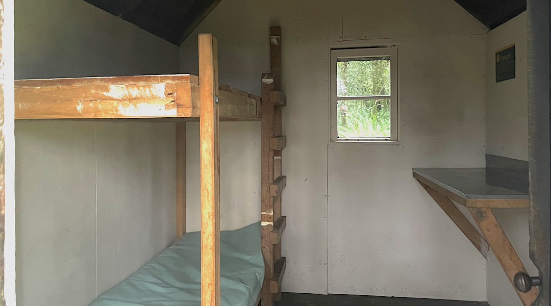 Two bunks and a short bench. | Rodger Inlet Historic Hut