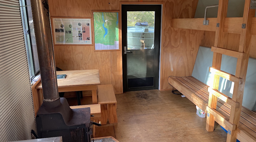 Living area table  | Slaughterburn Hut, Fiordland National Park