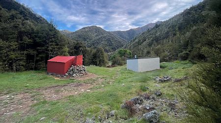 Old and new huts are close together and share a toilet. | Boulder Forks Huts, South Marlborough