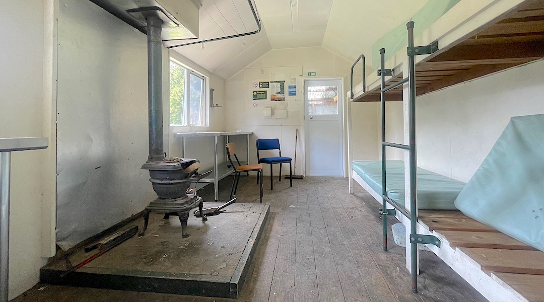 New stainless steel benches, and aluminium framed windows and door. | Caves Hut, South Marlborough