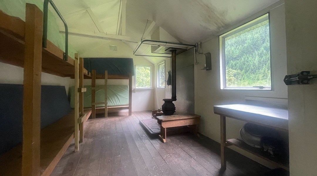 Three big aluminium-framed windows. |  Siberia Hut, Branch River, Marlborough
